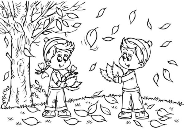 Two Kids With Fallen Leaves in Autumn