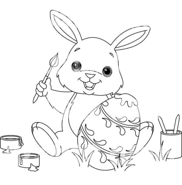Funny Bunny Painting An Easter Egg