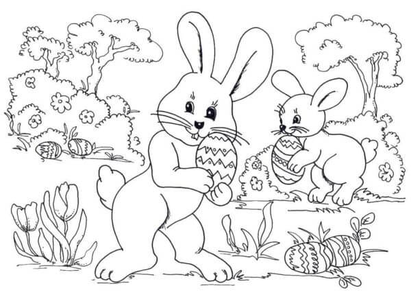Two Bunnies With Easter Eggs In The Jungle